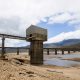 Cape Town's main water supply from the Theewaterskloof dam outside Grabouw, Cape Town, South Africa, Tuesday, Jan. 23, 2018. A harsh drought may force South Africa's showcase city of Cape Town to turn off most of its taps, as the day that the city runs out of water, ominously known as "Day Zero", moves ever closer for the nearly 4 million residents.(AP Photo)